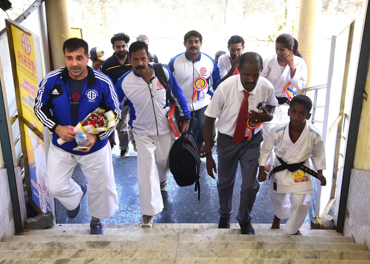 Instructors and students welcoming Renshi Pelekis to the seminar venue