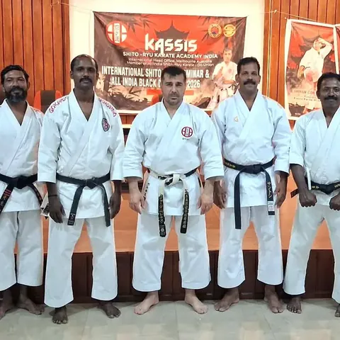 Black belts of Kassis Karate Academy India standing in line